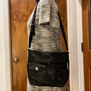 Stone Mountain black leather purse. 12x6” with 16” strap drop. Clean. 9 pockets